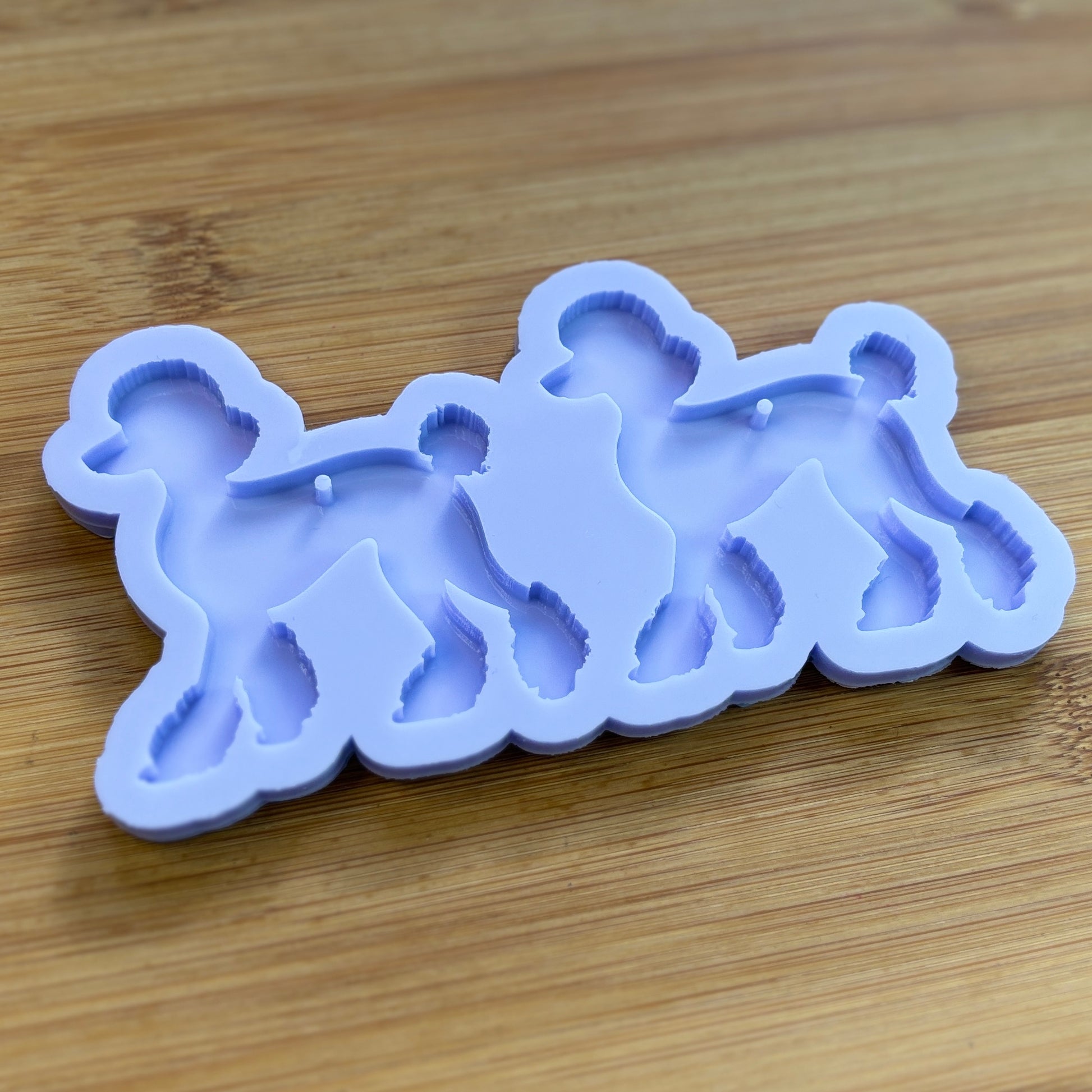 Poodle Silicone Mold with 2 cavities, made with Food Safe Silicone suitable for both food and craft projects.