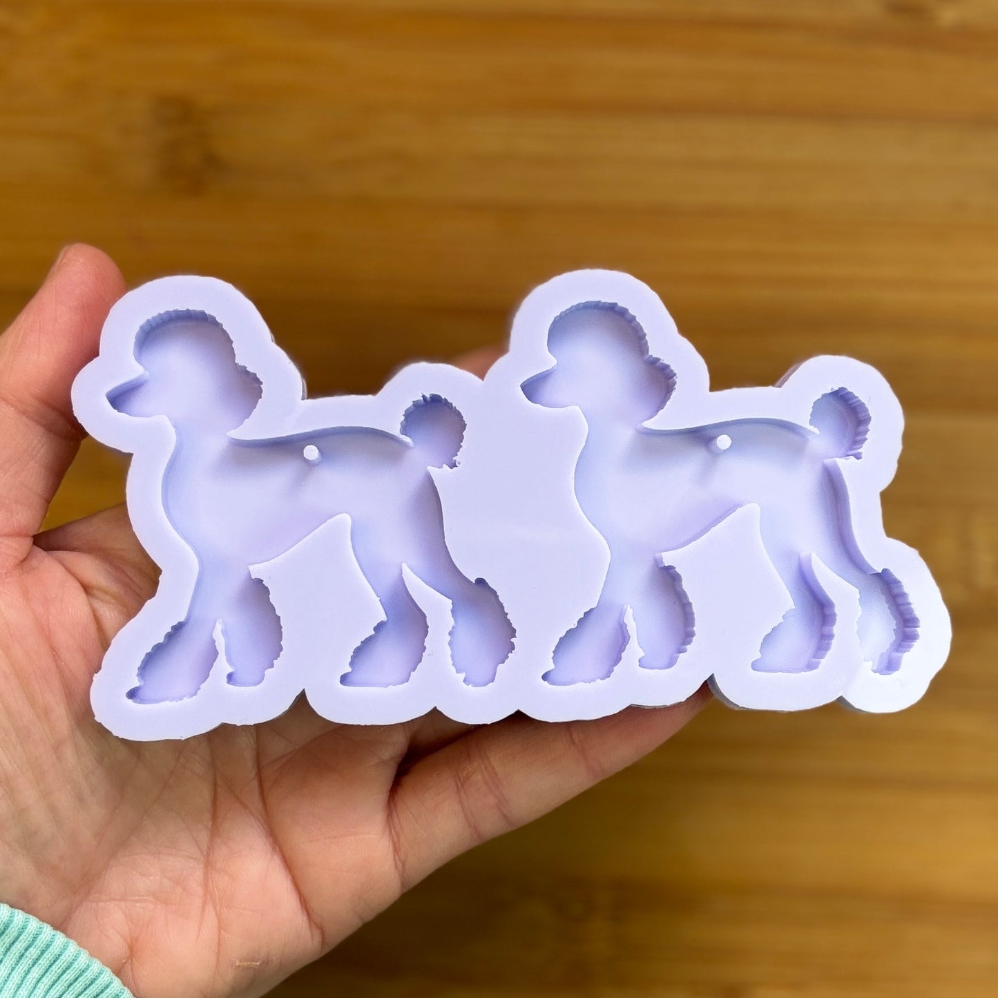 Poodle Silicone Mold with 2 cavities, made with Food Safe Silicone suitable for both food and craft projects.