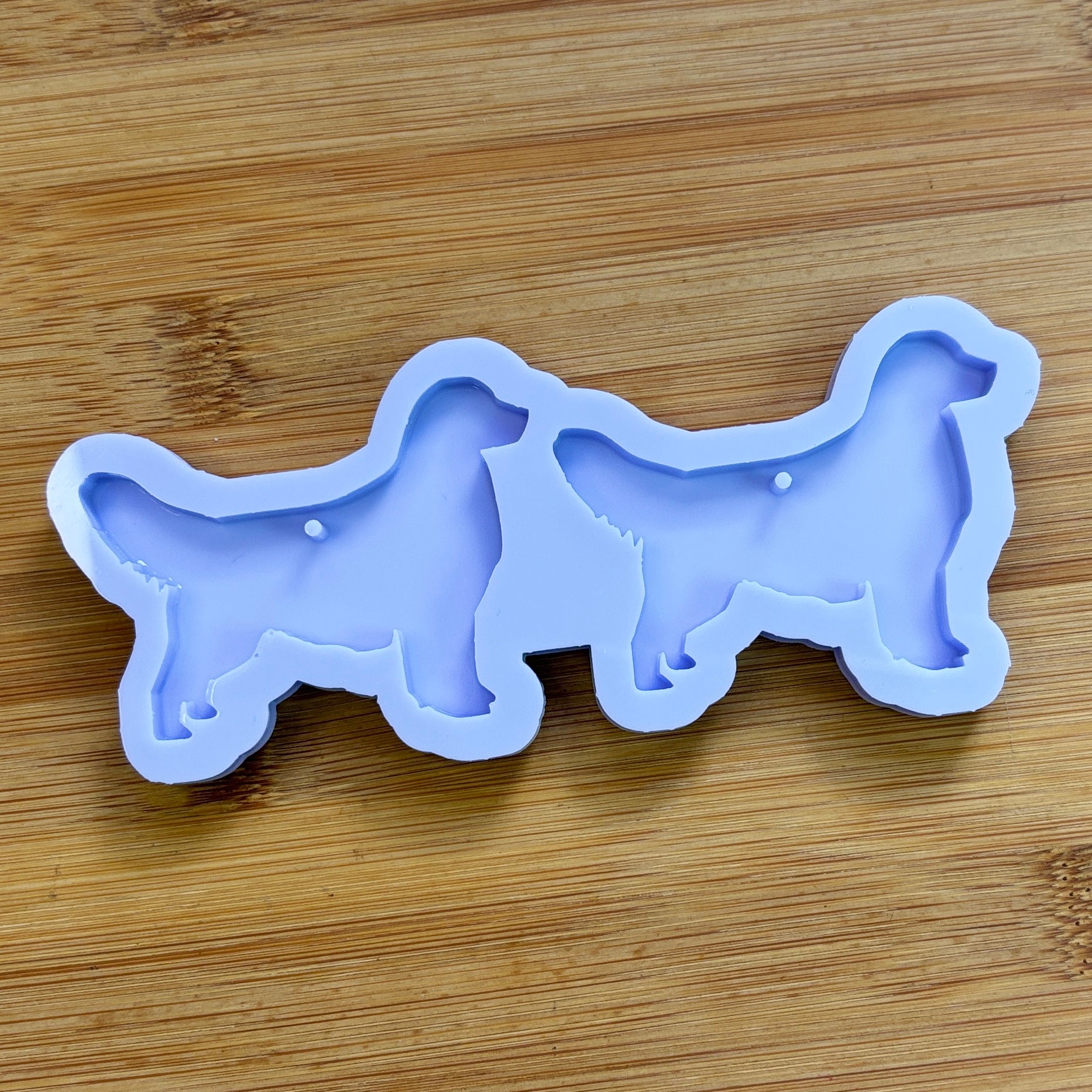 Golden Retriever Silicone Mold with 2 cavities, made with Food Safe Silicone suitable for both food and craft projects.