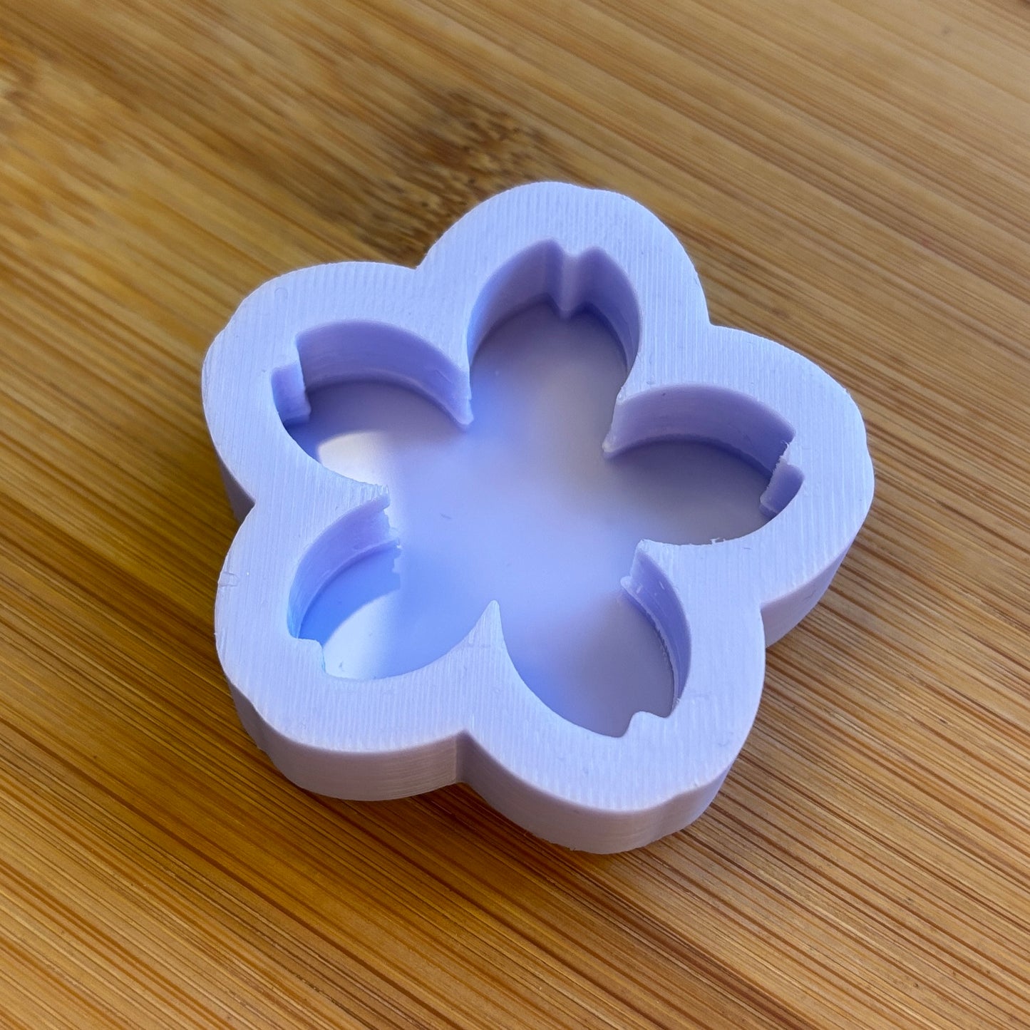 4cm Sakura Silicone Mold with 1 cavity, made with Food Safe Silicone suitable for both food and craft projects.