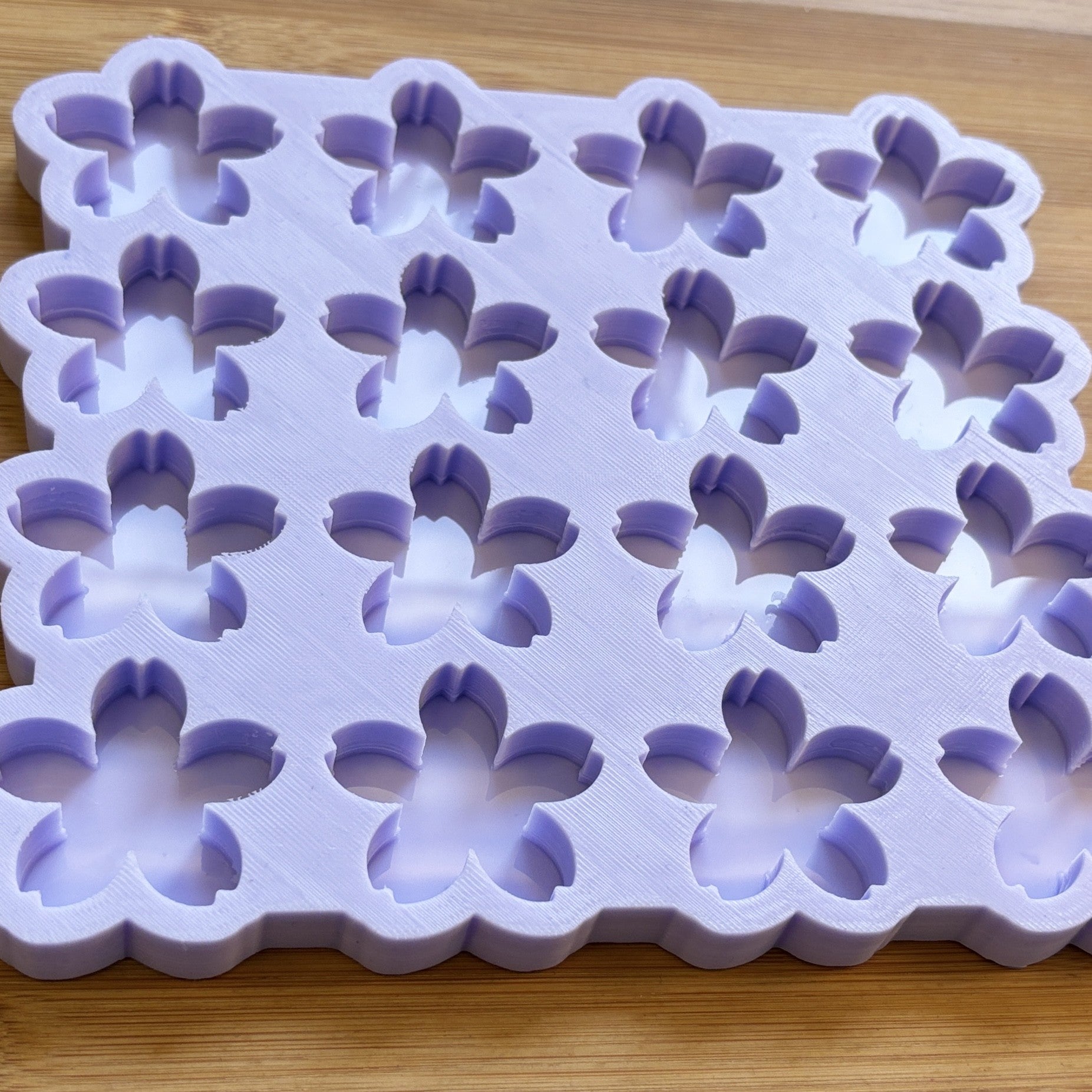 Sakura Silicone Mold with 16 cavities of 4 cm each, made with Food Safe Silicone suitable for both food and craft projects