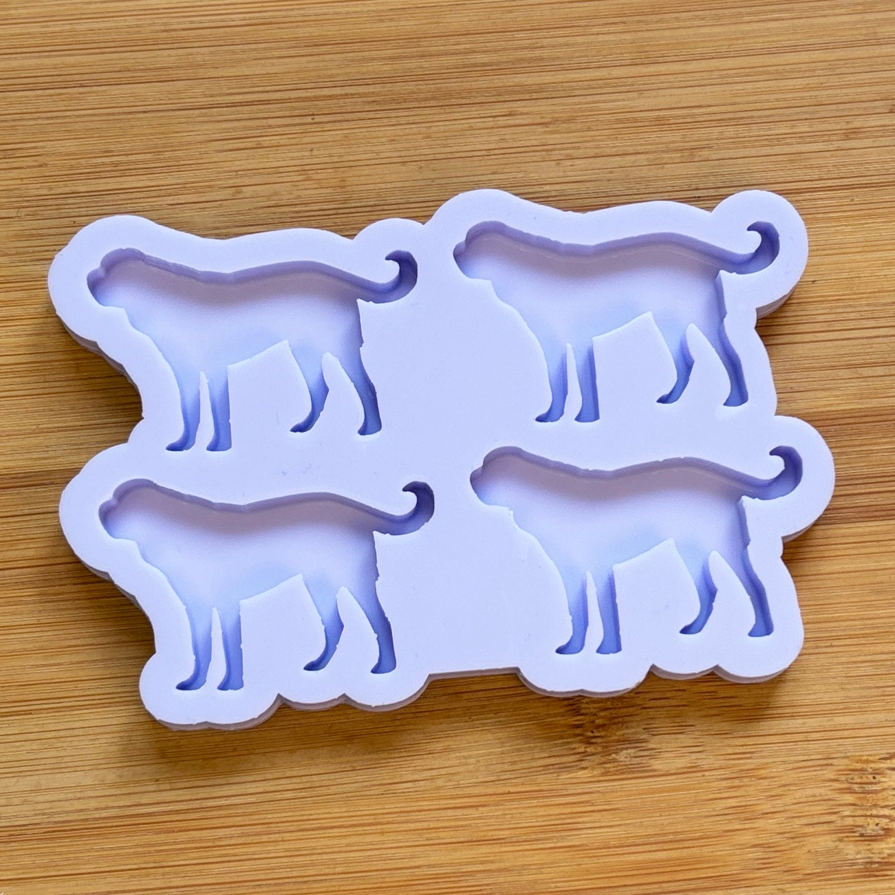 Saint Bernard Dog Silicone Mold with 4 cavities, made with Food Safe Silicone suitable for both food and craft projects