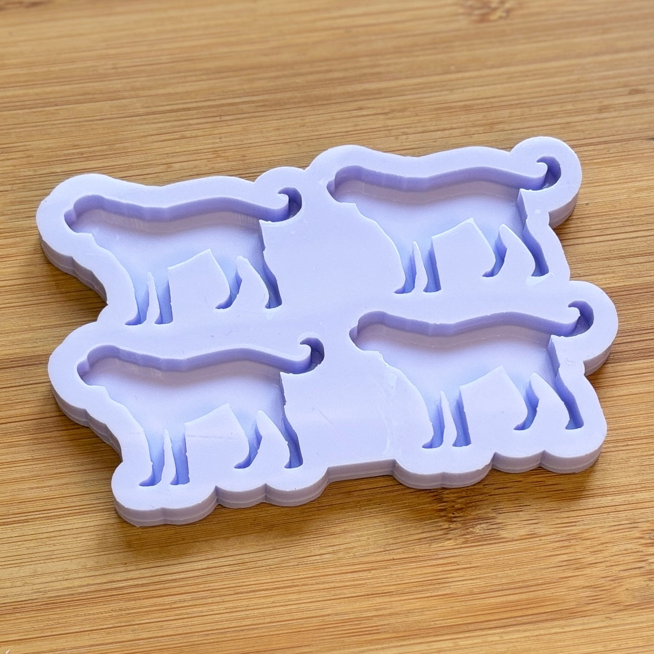 Saint Bernard Dog Silicone Mold with 4 cavities, made with Food Safe Silicone suitable for both food and craft projects