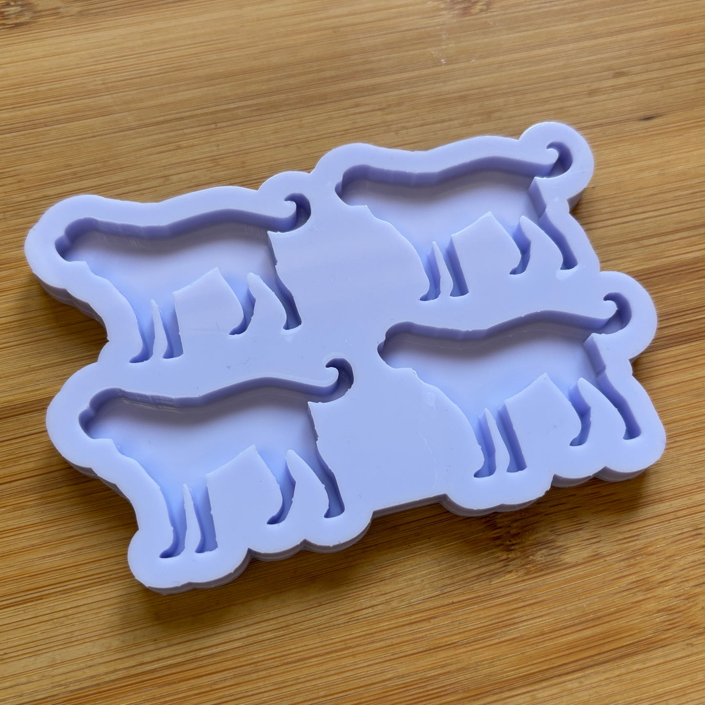 Saint Bernard Dog Silicone Mold with 4 cavities, made with Food Safe Silicone suitable for both food and craft projects