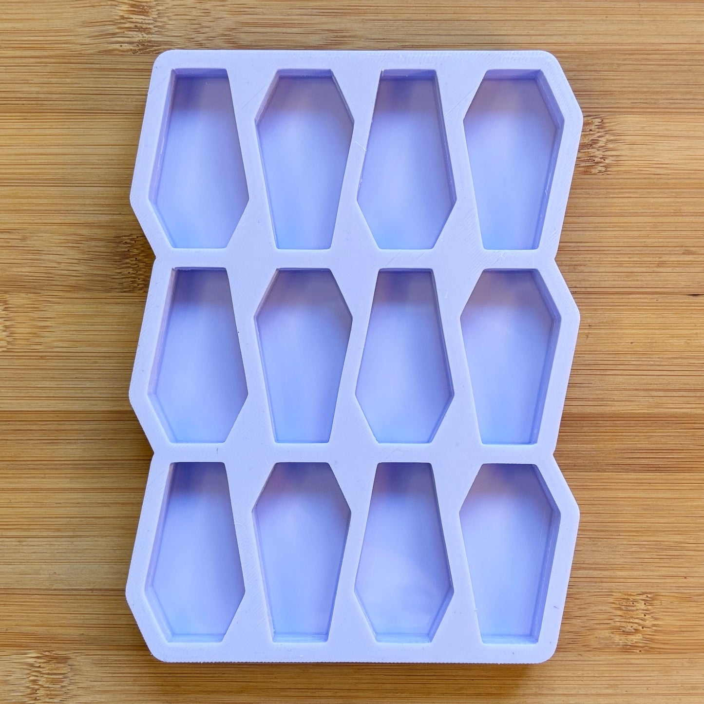 Coffin Silicone Mold with 12 cavities of 2 inches each, made with Food Safe Silicone suitable for both food and craft projects