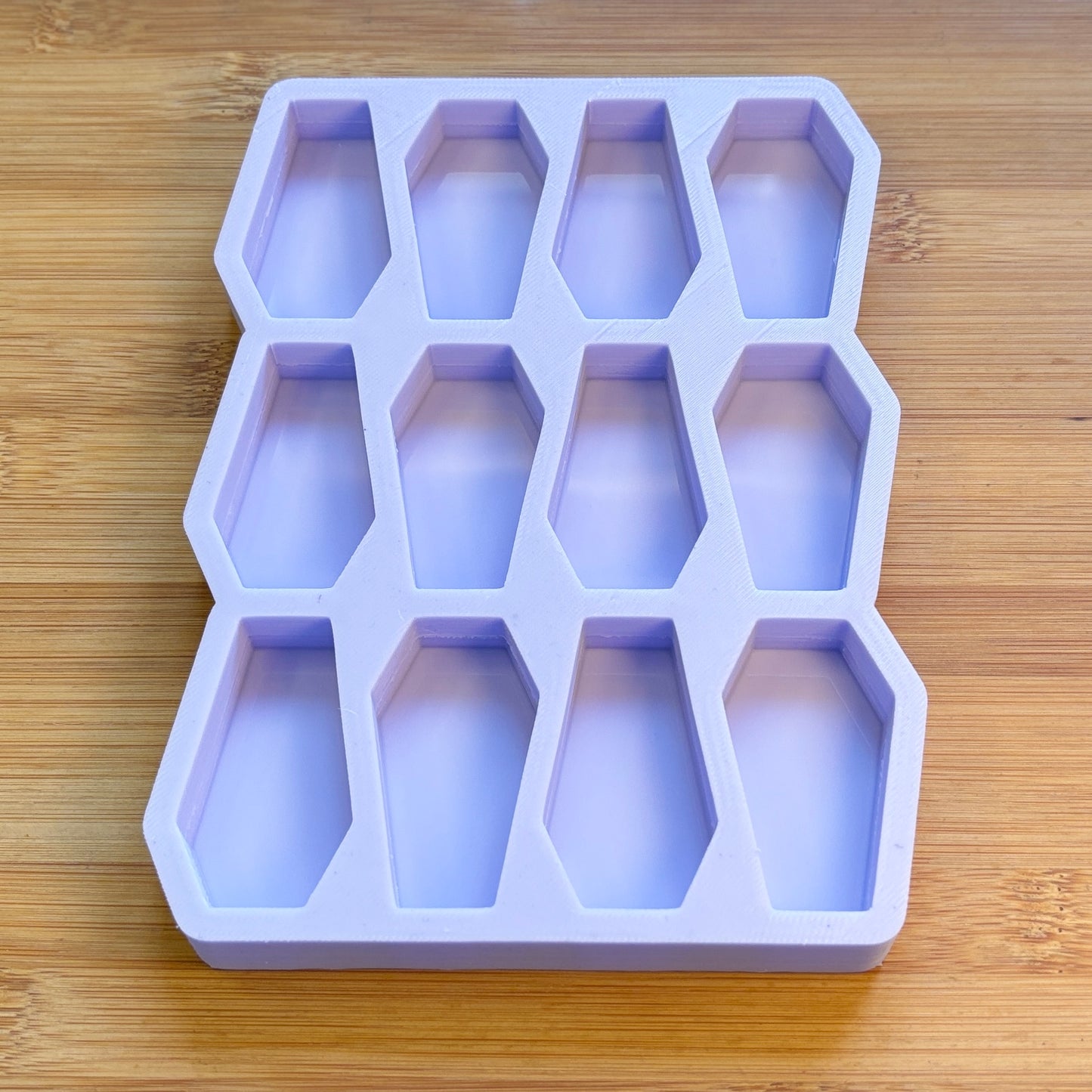 Coffin Silicone Mold with 12 cavities of 2 inches each, made with Food Safe Silicone suitable for both food and craft projects