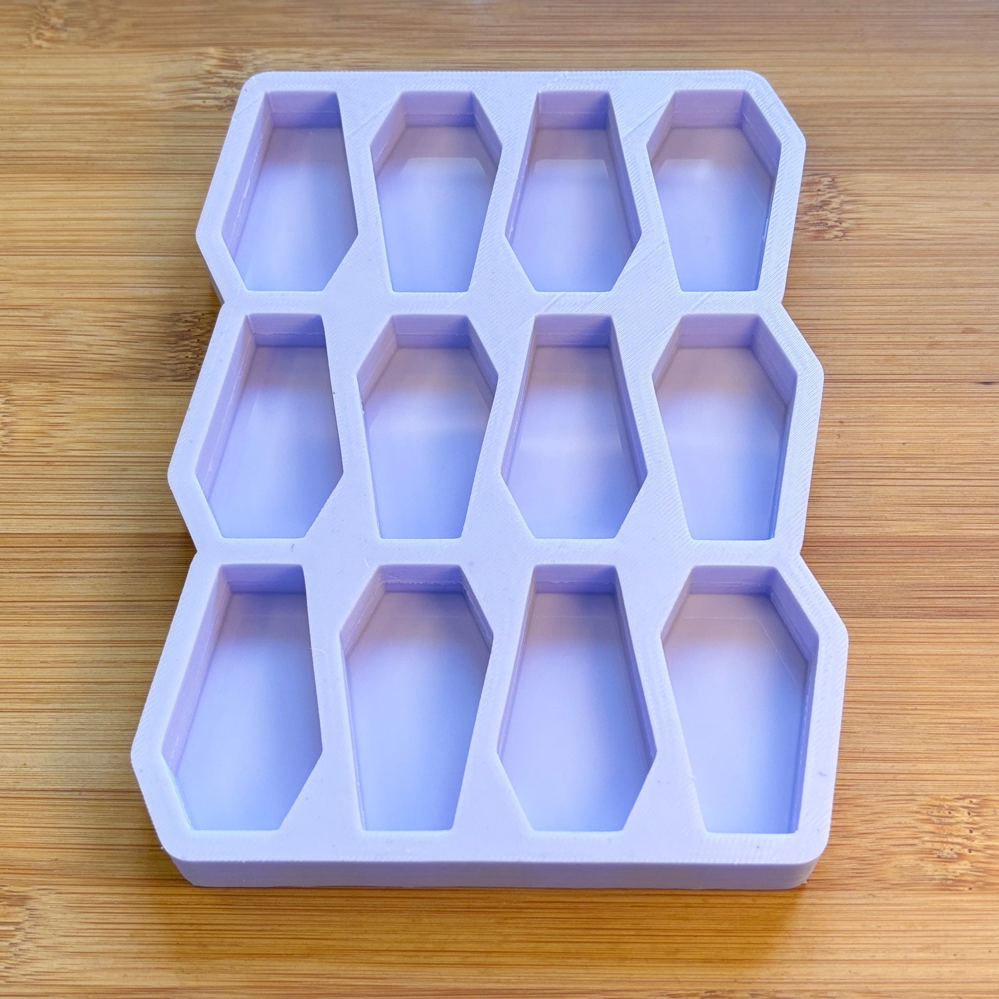 Coffin Silicone Mold with 12 cavities of 2 inches each, made with Food Safe Silicone suitable for both food and craft projects