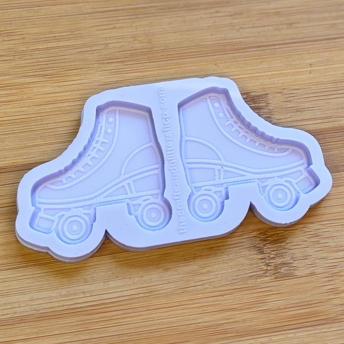 Roller skate silicone mold on a wooden surface