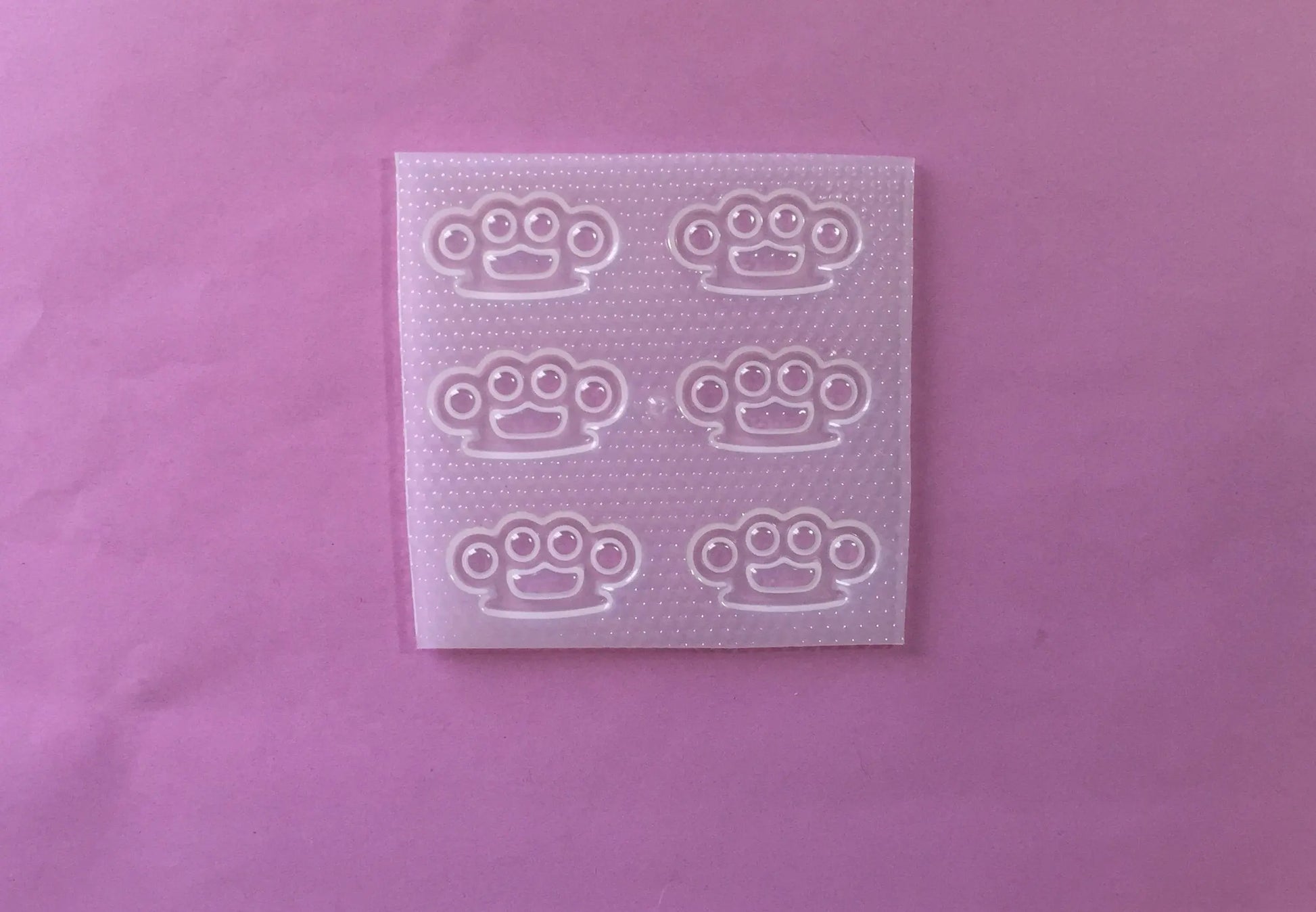 Small Brass Knuckles Plastic Mold